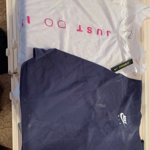 Two Nike workout shirts